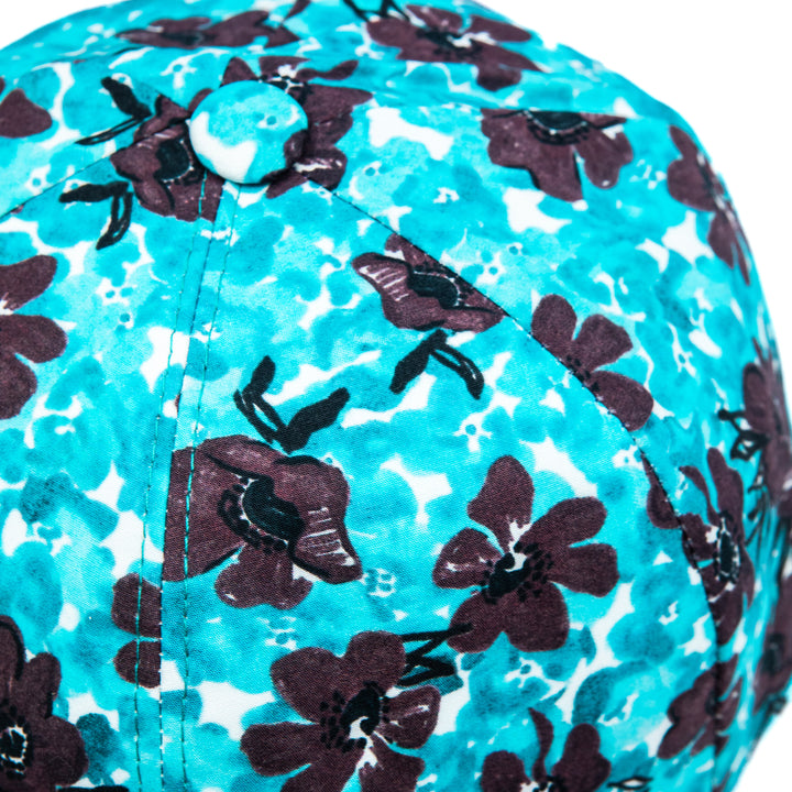 Cappellino da baseball floreale turchese